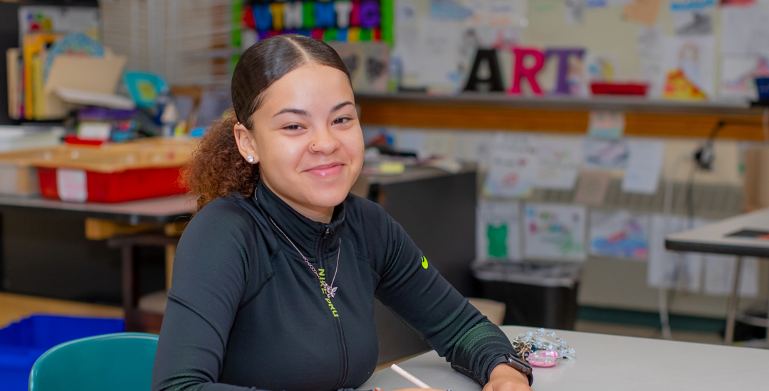 BEST Smiling Female Student with Pencil In Hand 2