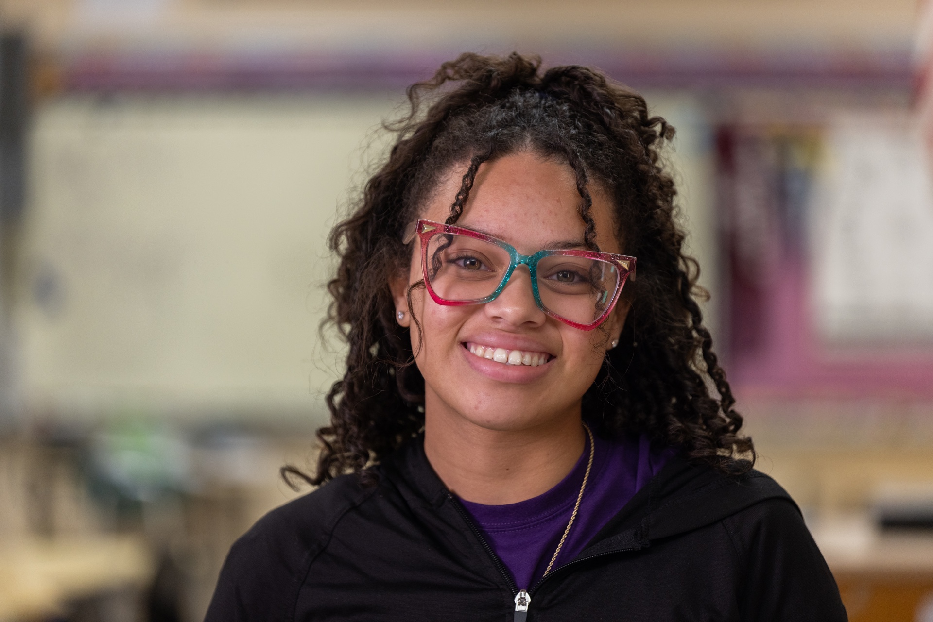 Rise Student Smiling in Hallway SEZP